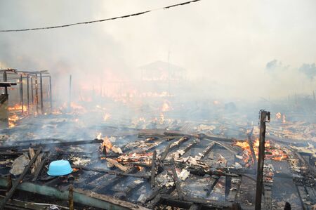 TARAKAN, INDONESIA - MAY 29: Fires in densely populated urban waterfront on May 29, 2013 at Tarakan, Indonesia のeditorial素材