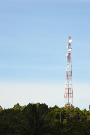 telecommunications tower against blue skyの写真素材