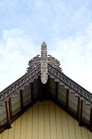 borneo traditional tribal carvings on the roof top of buildingsの写真素材