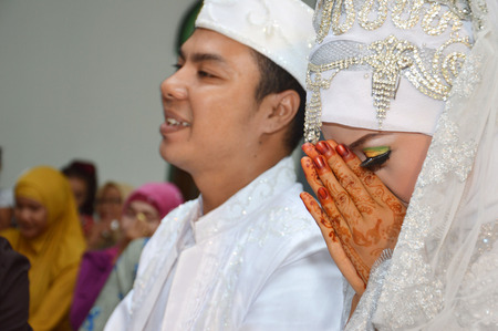 Indonesian bridal couples were undergoing the marriage ceremony eventの写真素材