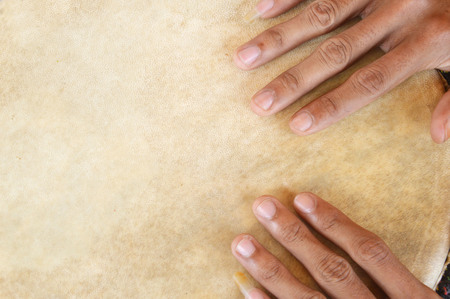 detail of brown traditional drumの写真素材