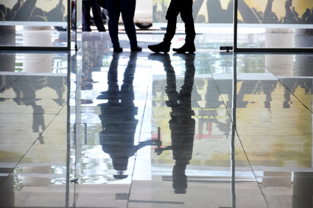 silhouette human reflection on the floorの写真素材