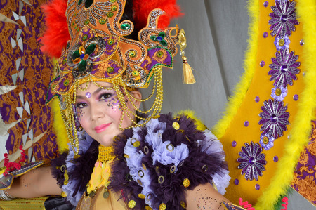 TARAKAN, INDONESIA - NOV, 16, 2014 : portrait of beautiful young woman with costumes and make up with ethnic-themed in celebration 3rd Tarakan Cultural Carnival on Dec 23, 2012  in Tarakan, Indonesiaのeditorial素材
