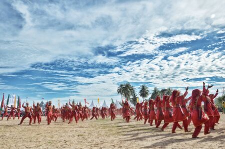 TARAKAN, INDONESIA - DEC 27 : colossal dance on the decrease procession of  Padaw Tuju Dulun boat to...