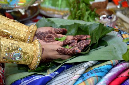 Henna On Hands Of Bugisnese Indonesian Wedding Bride at "Mappacci" ceremonialの写真素材