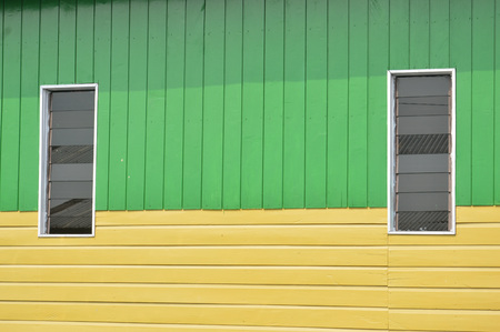 the window with glass on a wooden wallの写真素材