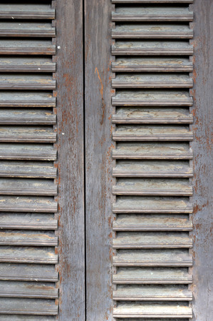 old brown wooden doors on a barnの写真素材