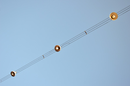 row lights against blue skyの写真素材