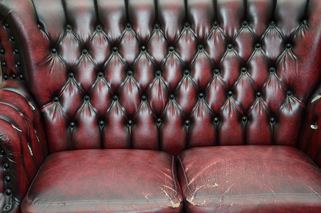 texture and pattern of red dark leather seat upholsteryの写真素材