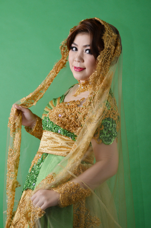 Portrait of beautiful asian woman wearing modern kebaya clothの写真素材