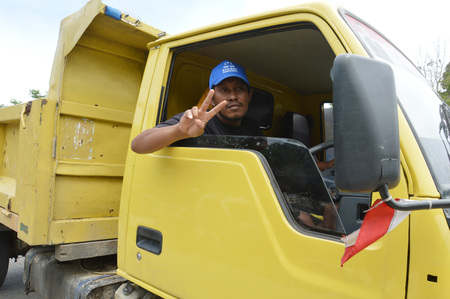 TARAKAN, INDONESIA. 16th September 2013. Asian man truck driverのeditorial素材