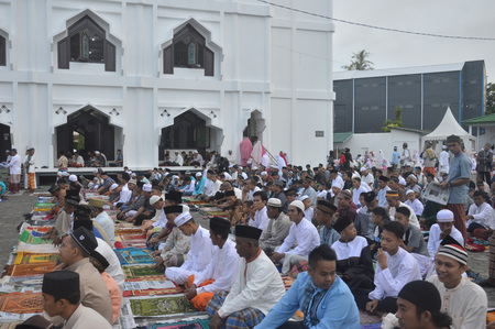 TARAKAN, INDONESIA - 25th June 2017 : The Muslim community performs Eid prayers at the mosque and...