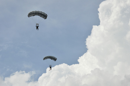 TARAKAN, INDONESIA, 17 DEC 2017 : attraction skydiving in the sky Iraw Tengkayu Festival at Amal Beach Tarakan, Indonesia, in the framework of the 20th anniversary of the cityのeditorial素材