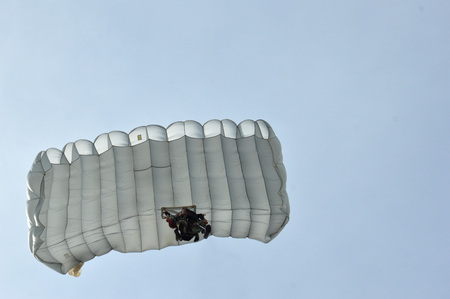 TARAKAN, INDONESIA, 17 DEC 2017 : attraction skydiving in the sky Iraw Tengkayu Festival at Amal Beach Tarakan, Indonesia, in the framework of the 20th anniversary of the cityのeditorial素材