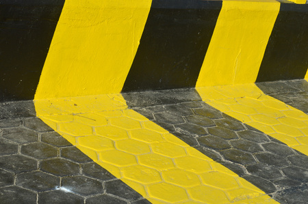 black and yellow strips on the wallの写真素材