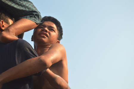 TARAKAN - INDONESIA. 17 August 2019 ; Panjat Pinang, Climbing slippery pole competition or Panjat Pinang indonesian traditinal games.のeditorial素材
