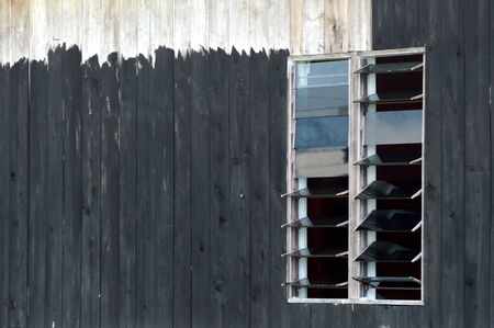 the old wooden windows on wooden house