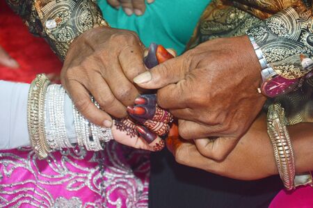 " Mappasikarawa"  Bugis tribal wedding tradition is done at the first meeting between the bride and groomの写真素材
