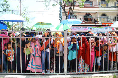 TARAKAN - INDONESIA, 25th July 2018 : enthusiastic audience of the APEKSI march on the roadside