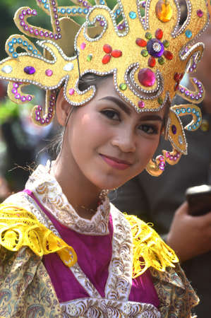 TARAKAN - INDONESIA, 25 July 2018 : Portrait of a beautiful Indonesian woman smiling wearing traditional  clothing from the City of Padang Sidempuan, North Sumatra. APEKSI Cultural Parade Tarakan City in 2018のeditorial素材