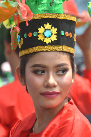 TARAKAN - INDONESIA, 25 July 2018 : Portrait of a beautiful Indonesian woman smiling wearing traditional  clothing.APEKSI Cultural Parade Tarakan City in 2018のeditorial素材