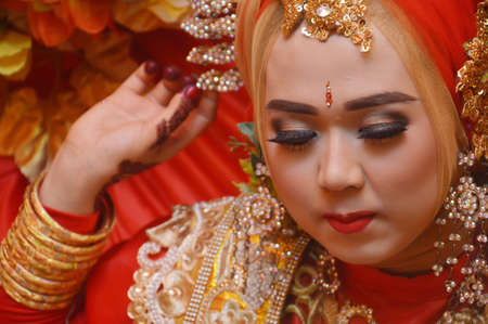 TARAKAN - INDONESIA, 4 APRIL 2018 : portrait of a beautiful bugis bride wearing a traditional Bugis bridal dress before or on her wedding dayのeditorial素材