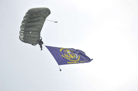 TARAKAN - INDONESIA, 10 MAY 2017  : skydiving attractions by members of the Indonesian armed forces at the Latsitarda closing ceremony at the Datu Adil Stadiumのeditorial素材