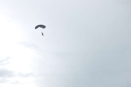 TARAKAN - INDONESIA, 10 MAY 2017  : skydiving attractions by members of the Indonesian armed forces at the Latsitarda closing ceremony at the Datu Adil Stadiumのeditorial素材