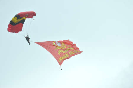 TARAKAN - INDONESIA, 10 MAY 2017  : skydiving attractions by members of the Indonesian armed forces at the Latsitarda closing ceremony at the Datu Adil Stadiumのeditorial素材