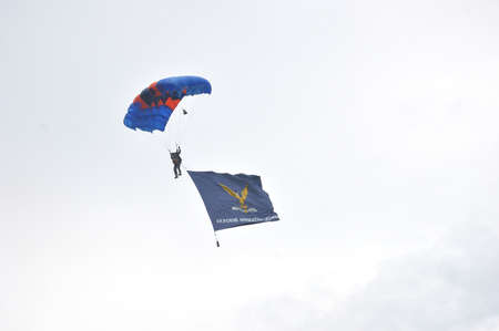 TARAKAN - INDONESIA, 10 MAY 2017  : skydiving attractions by members of the Indonesian armed forces at the Latsitarda closing ceremony at the Datu Adil Stadiumのeditorial素材
