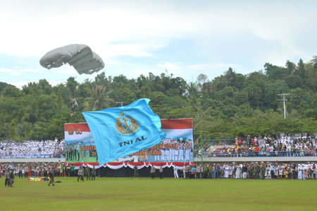 TARAKAN - INDONESIA, 10 MAY 2017  : skydiving attractions by members of the Indonesian armed forces at the Latsitarda closing ceremony at the Datu Adil Stadiumのeditorial素材