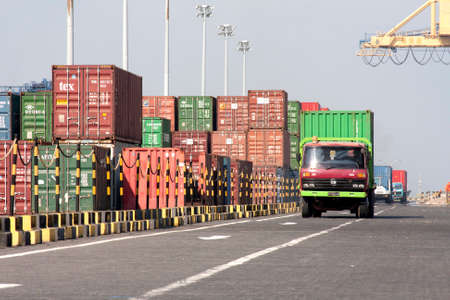 MAKASSAR-  INDONESIA - 15th June 2011 : container loading and unloading activities in the port of...