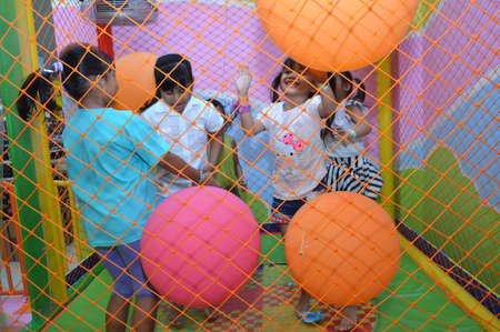 TARAKAN - INDONESIA, 28 JUNE 2016 : the little girls happily play around in the indoor playgroundのeditorial素材