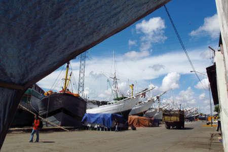 SURABAYA - INDONESIA, 23 JUNE 2013 : The atmosphere of the port of Kalimas Surabaya.