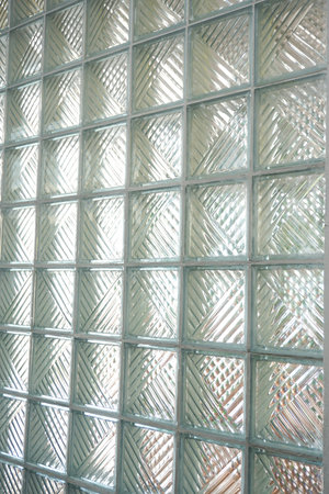 Glass brick wall offers a textured, modern architectural detail. Perfect for backgrounds, design...