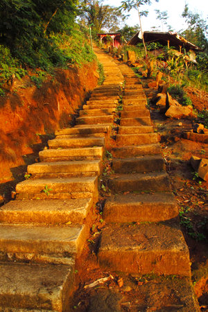 elongated rock ruins stacked into a pyramid at the Gunung Padang megalithic site located in Cianjur,...