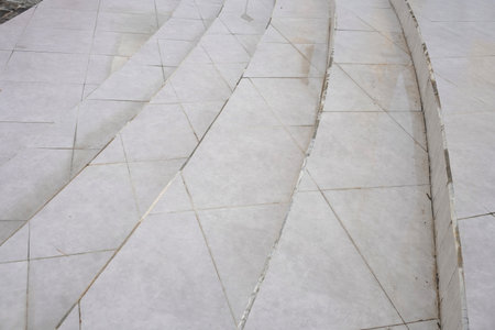 Discover clean, modern tiled steps offering a subtle upward path. This minimalist design features...