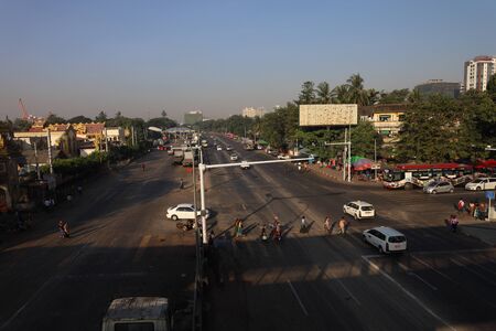 YANGON/MYANMAR - 25th Dec, 2019 : street in the city, sule pagoda, yangonのeditorial素材