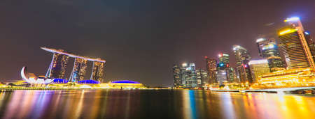 SINGAPORE/SINGAPORE - 01st July, 2019 : Singapore cityscape at dusk. Landscape of Singapore business building around Marina bay.のeditorial素材