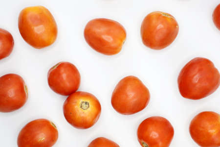 red tomatoes background. Group of tomatoes. fresh vegetarian.のeditorial素材