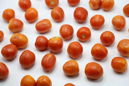 red tomatoes background. Group of tomatoes. fresh vegetarian.のeditorial素材