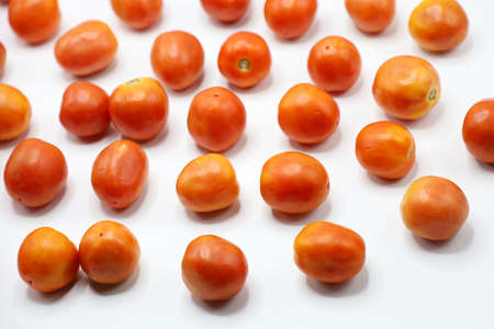 red tomatoes background. Group of tomatoes. fresh vegetarian.のeditorial素材
