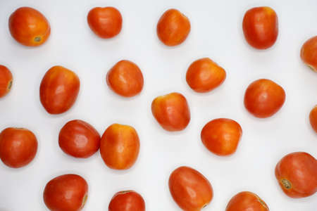 red tomatoes background. Group of tomatoes. fresh vegetarian.のeditorial素材