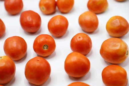 red tomatoes background. Group of tomatoes. fresh vegetarian.のeditorial素材