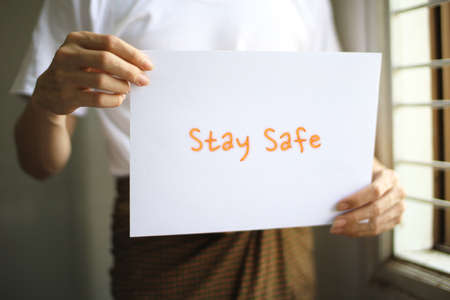 Wash your hands with water. Stay at Home, Stay Safe.のeditorial素材