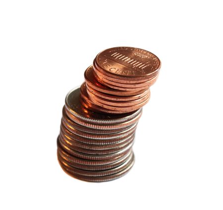 American quarters and pennies isolated on whiteの写真素材