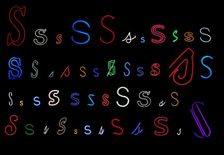 collection of a number of different neon letter S isolated on black - part of a series of neon lettersの写真素材