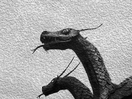 A majestic dragon with two heads in the cloudsの写真素材