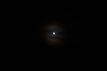 An object in the night sky called the moonの写真素材