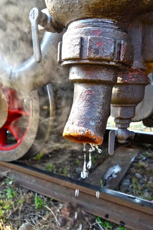 Hot water flows from the locomotive